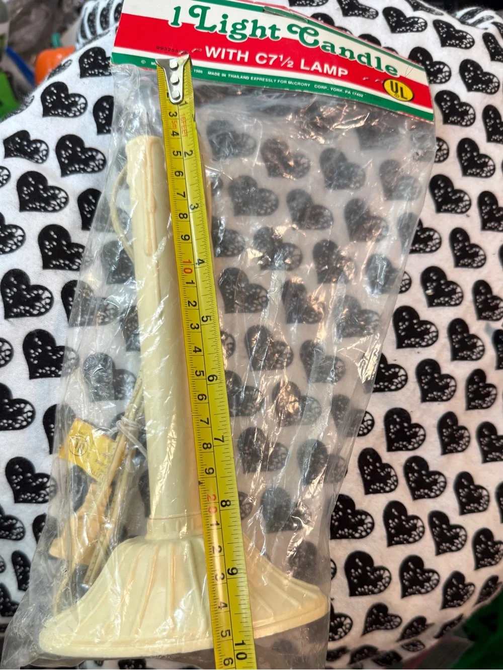 vintage ivory-colored plastic electric candolier designed for window disp